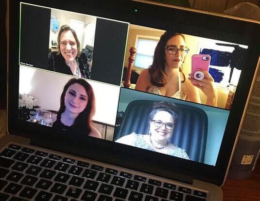 A computer screen showing a group of 4 Zoom Babes at a virtual happy hour.